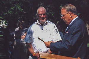 Library employee (Larry Webber) at a tree dedication ceremony in Library Park