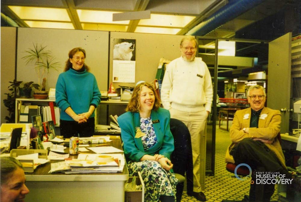 Marg Portow, Larry Webber, Sue-Ellen Jones, and Bob Copeland in the old Reference office of the Main Library